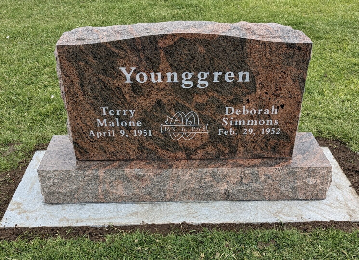 Granite headstone with engraved names