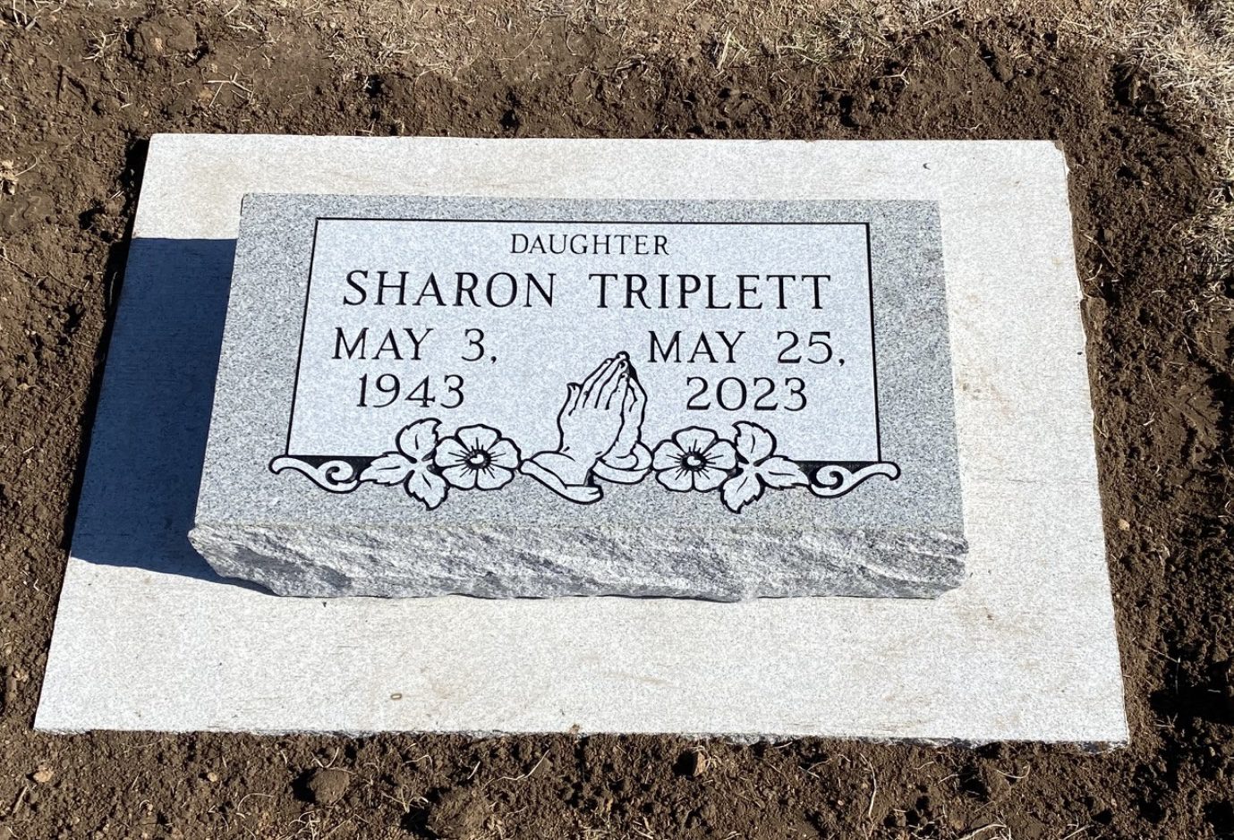 Gravestone with floral design