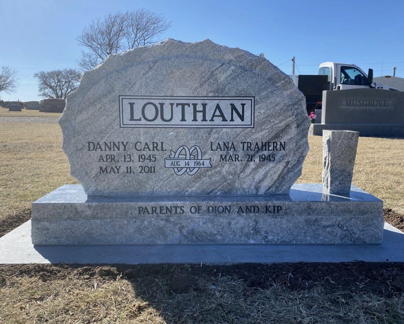 Memorial stone under clear sky