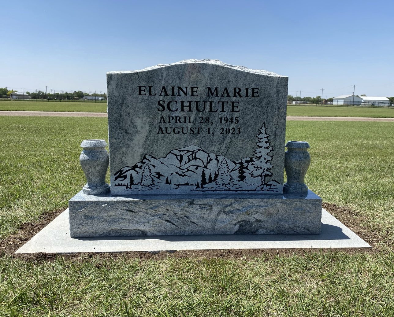 Memorial marker with nature design